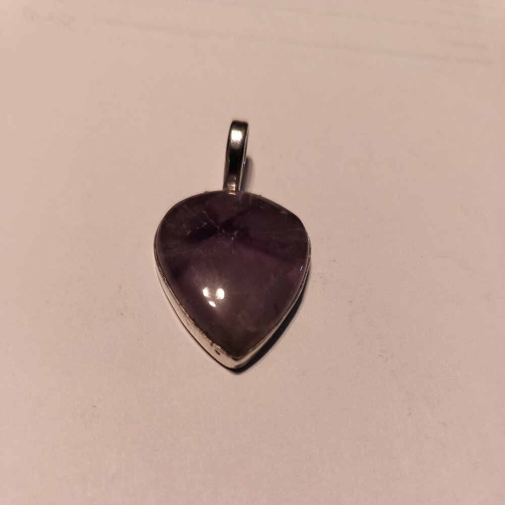 PURPLE AMETHYST TEARDROP PENDANT SET IN SILVER MOUNTING